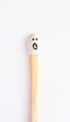 matchstick with faces painted on the heads