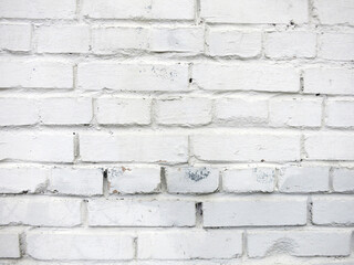 Obraz premium The white brick wall is painted with paint