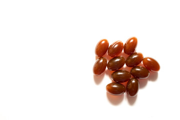 Lecithin drugs macro photo. Lecithin gel pills. Photo, pills isolaed on a white background.