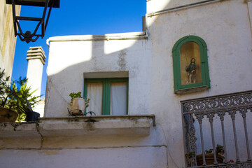 Fototapeta na wymiar Votive Aedicule and window, Southern Italy, Apulia