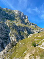 The Cares Route in the heart of Picos de Europa National Park, Cain-Poncebos, Asturias, Spain. Narrow and impressive canyon between cliffs, bridges, caves, footpaths and rocky mountains.