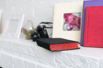 Close up of bible on table over white wall background, Christian faith and education or devotional