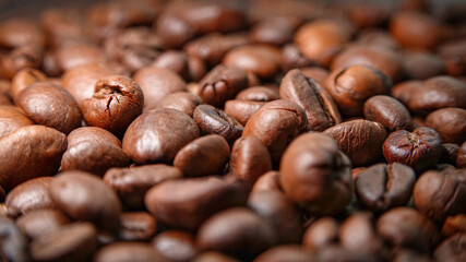 texture of well-roasted coffee beans in warm colors