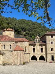 Fototapeta na wymiar Potes, Spain - September 2, 2020: The Monastery of Santo Toribio de Liébana is a Roman Catholic monastery located in the district of Liébana, near Potes in Cantabria, Spain.