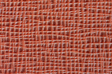 Texture of grainy genuine leather, brown color. Concept of shopping, manufacturing. For background