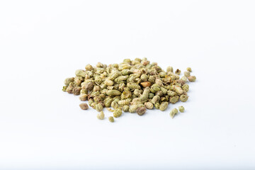 Heap of Dried thyme seeds. Isolated on white background. 