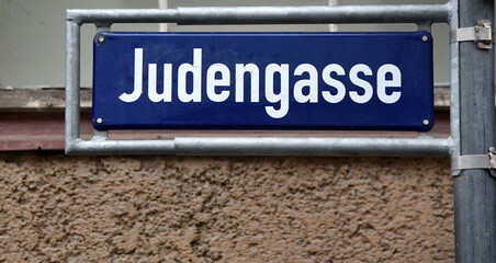Obraz premium Blaues Straßenschild: Judengasse