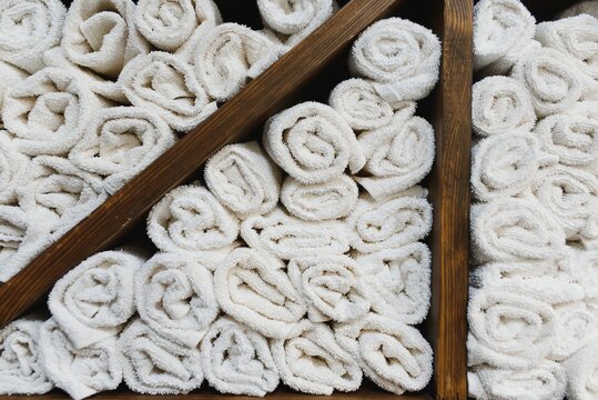 white clean barberman towels rolled into a cylinder