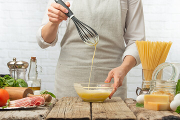 Chef Preparing Cheese Sauce, Light Kitchen Recipe Book, Cooking and GastronomyChef Preparing Cheese Sauce, Light Kitchen Recipe Book, Cooking and Gastronomy