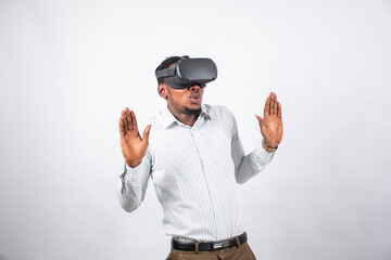 black man reacting to using a virtual reality goggle, expressing being immersed in the experience