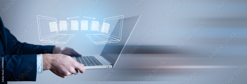 Poster man holding computer with transfer file