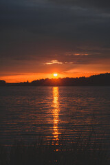 Naklejka premium sunset over the lake