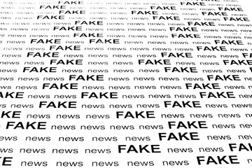 fake news printed background in black and white image printed on white paper