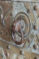 Antique medieval metal lion head door-knocker, Oravský Podzámok, Slovakia