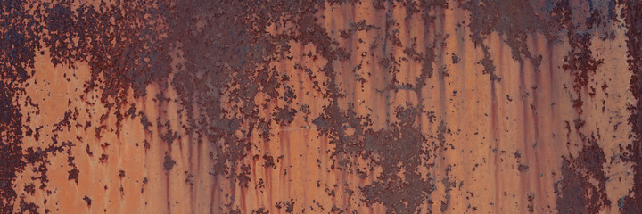Old rusty metal texture. Rust on the surface of the iron wall. Panoramic background for grunge...