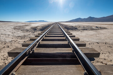 Railway tracks leading to Andes Mountains in the Atacama desert, Bolivia