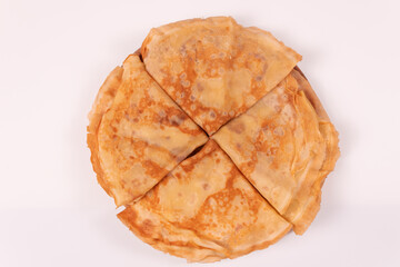 top view from afar on a circle of pancakes stacked in triangles