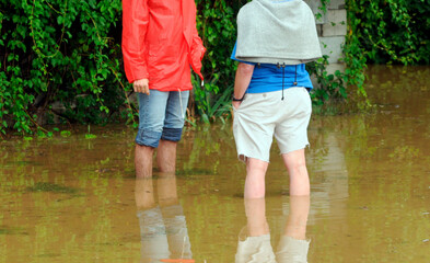 people after heavy rainfalls and thunderstorms