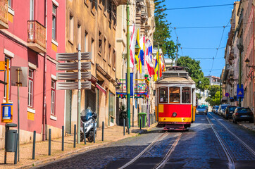 Famous vintage tram in the street of Alfama, Lisbon, Portugal