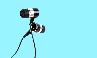 music earphones on the blue