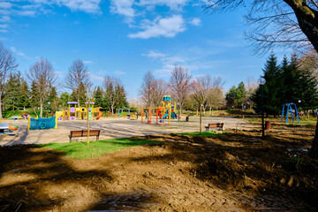 Colorful playground for children in botanical park bursa. Colorful slider and green plant...