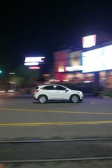 White car in the night ride