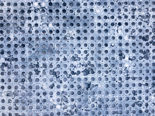 Snow on the rubber shoe wiper. Multiple holes rectangle shape pattern.
