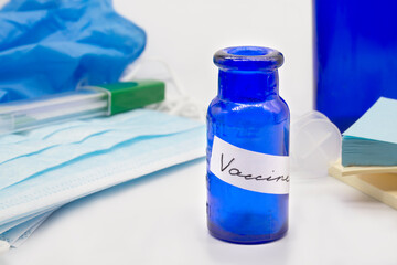 vaccine Vintage bottles, medical disposable masks and gloves. Fight against virus covid-19, corona virus immunization concept