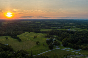 Fototapeta premium The sun sets over farmland near Darnestown, Montgomery County, Maryland.