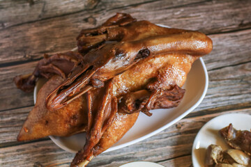 Delicious golden brown duck or steamed duck in Paloe or Lou mei Sauce (Thai name is Pedpalow) for Offering Sacrifices On Chinese New Year.