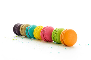 Selective focus Multi colored macarons desserts with copy space isolated on white background