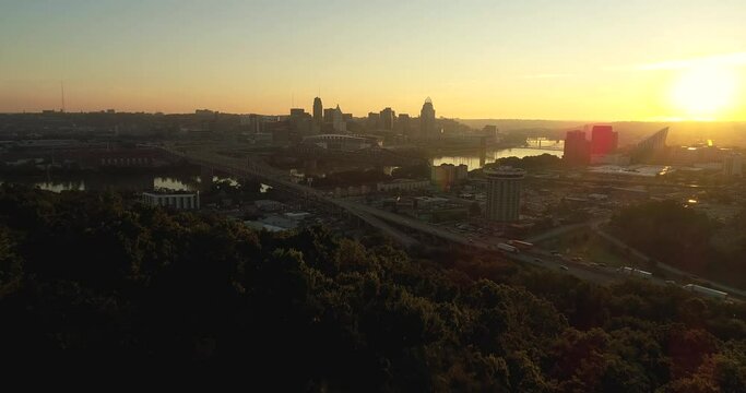 Aerial view of downtown Cincinnati skyline during rush hour traffic along the Brent Spence Bridge.  