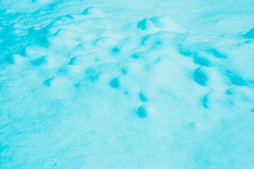 Surface of pure white snow with bumps.Winter image.