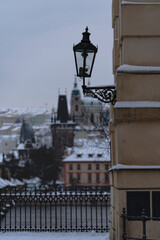 snowy lantern from street lights and blurred background in winter in the city center during the day 2021