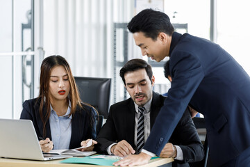 Diverse group of businesspeople working together in office.