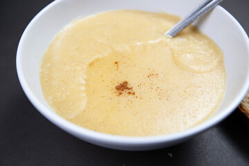 Cornmeal Porridge bowl close-up view, Selective Focus on porridge