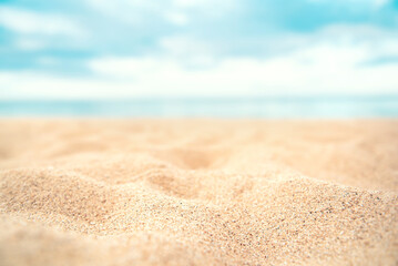 Fototapeta na wymiar Tropical summer sand beach on sea background, copy space.