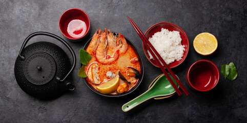 Traditional Thai soup Tom Yum and rice bowl