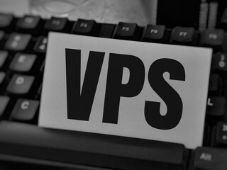 Fototapeta premium Selective focus text VPS on white card with keyboard.