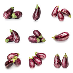 Set of fresh eggplants on white background