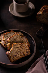 Slices of freshly baked banana bread on a ceramic plate
