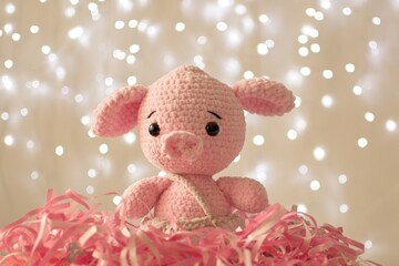 Soft toy pig crochet animal amigurumi - selective focus