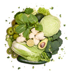 Group of green vegetables and fruits on white background