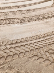 Tracks in the sand, car tire marks in the sand, , background for template