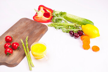 Fresh vegetable smoothie separated on white background. Tomatoes, papurka, choice focus.