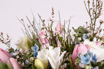 Spring flower arrangement with pink tulips 