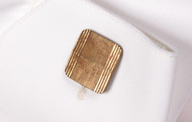 Cufflink on a white shirt