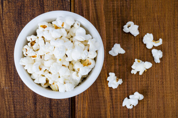 Sweet white airy crispy popcorn. Studio Photo