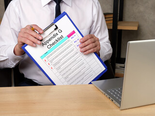  Financial concept about Appendix G Checklist with inscription on the sheet.