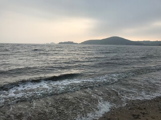 At dusk, looking at the beautiful sky and the blue sea